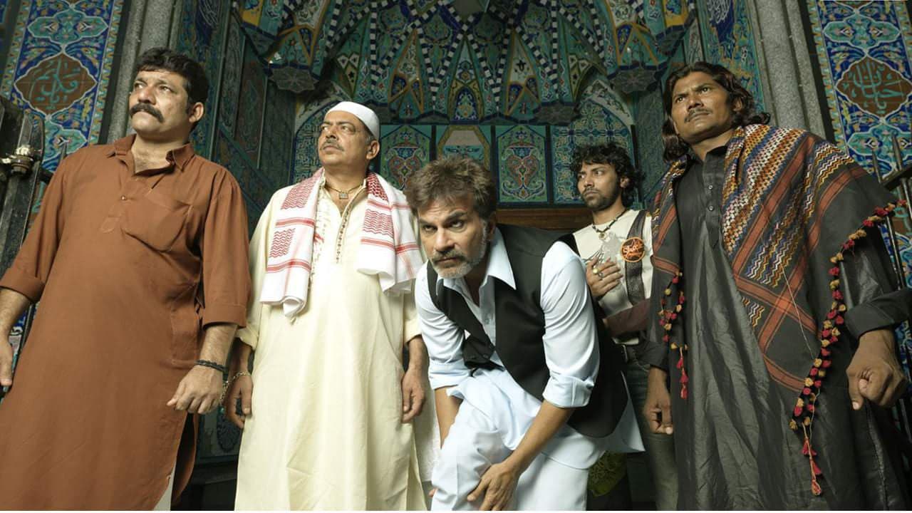 Bhindi Baazaar Inc. backdrop