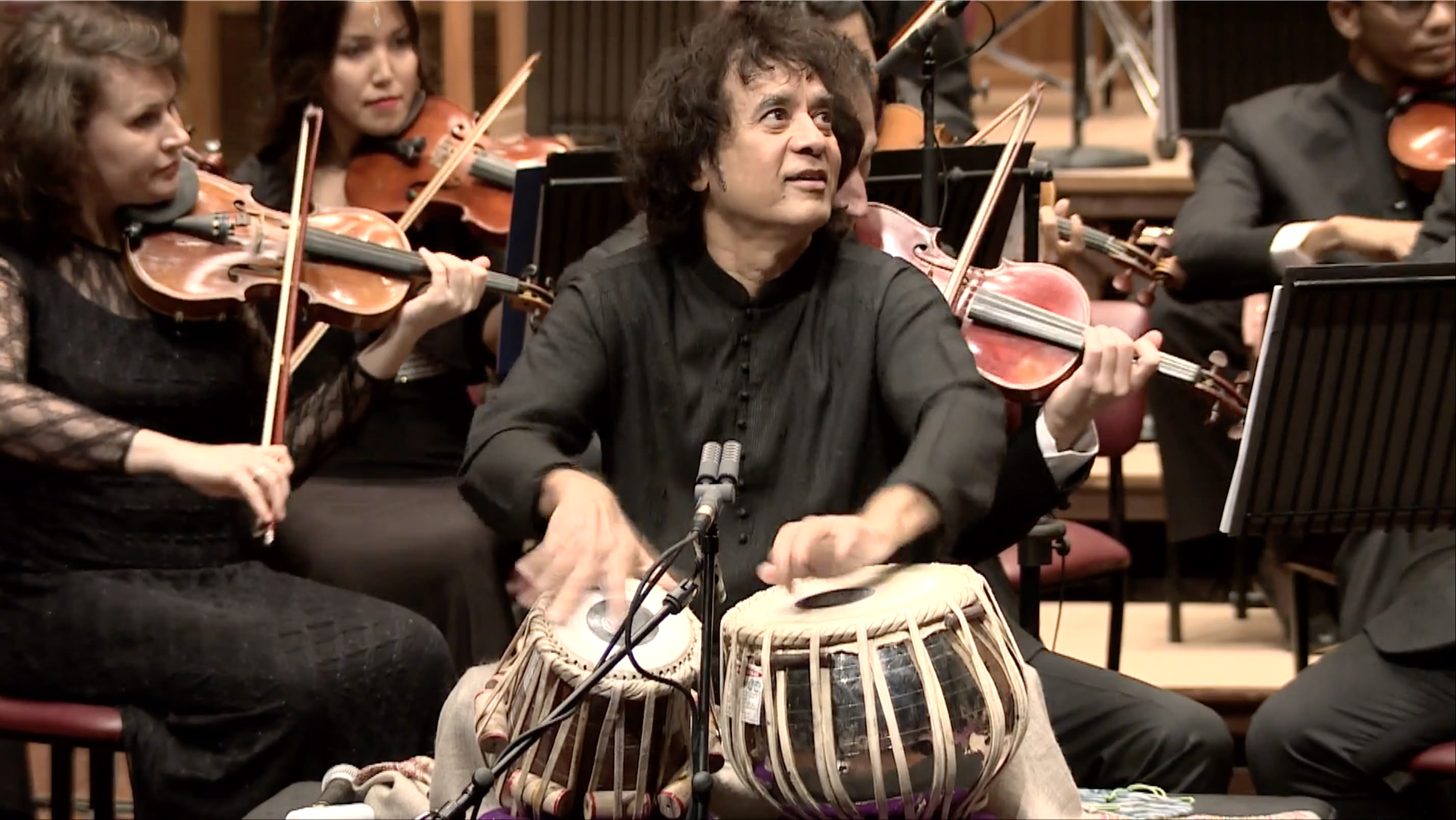 Zakir Hussain performs with Symphony Orchestra of India in Mumbai